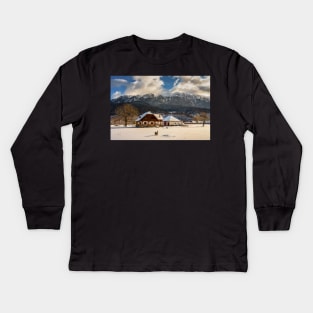 House by the mountains, winter time Kids Long Sleeve T-Shirt